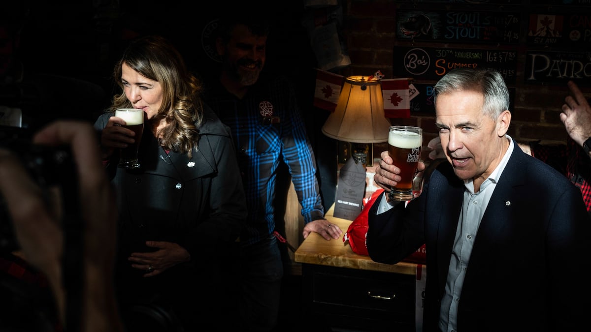 Carney, Smith tap a keg, have a beer, sing O Canada, urge Albertans stay in Canada